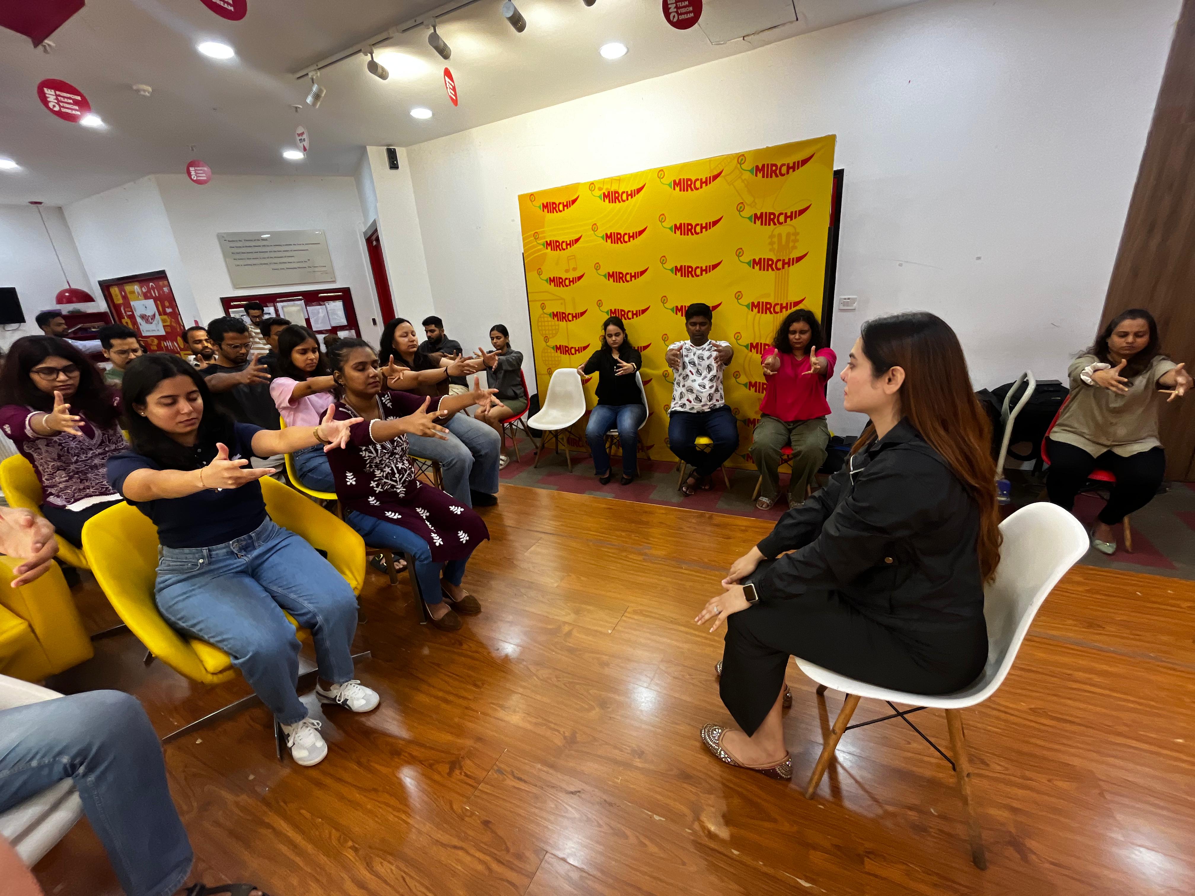 Vibha Jain leading a group quit smoking hypnotherapy programme